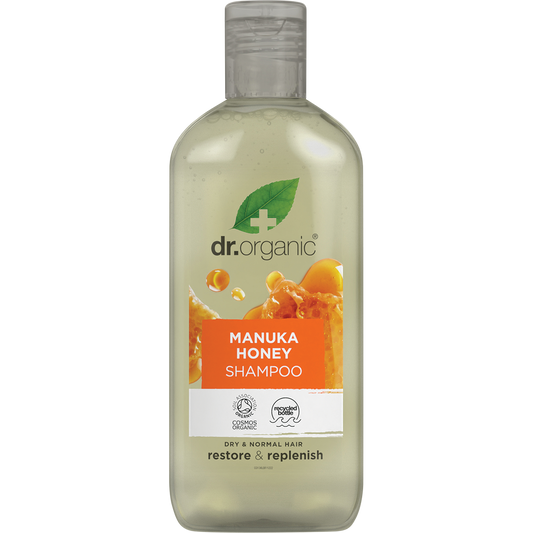 265ml bottle of Dr Organic Manuka Honey Shampoo for normal to dry hair on a white background.