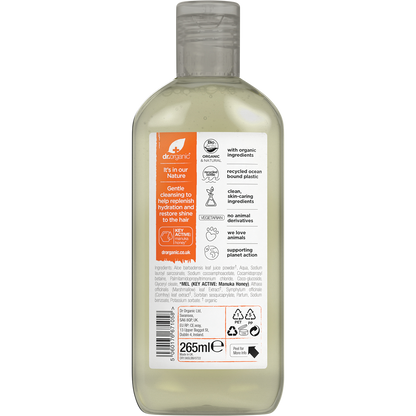 The back of a 265ml Dr Organic Manuka Honey Shampoo bottle showing directions, ingredients, and a barcode.