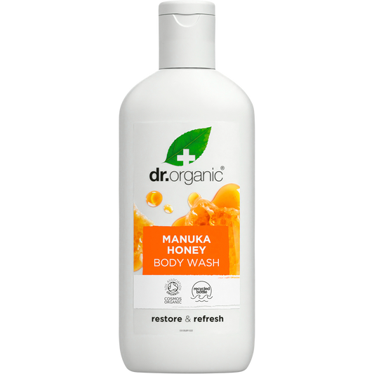 250ml bottle of Dr Organic Manuka Honey Body Wash with a yellow label and orange cap.
