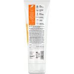 Back of a 125ml Dr Organic Manuka Honey Face Scrub tube showing ingredients and directions on a white background.