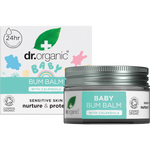 Dr Organic Baby Bum Balm 35g tub and box with botanical illustrations and a white lid on a white background.