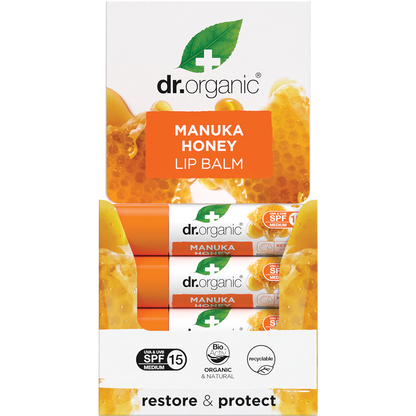Dr Organic Manuka Honey Lip Balm tube next to its retail display box on a white background.