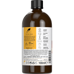 Back of Dr Organic 100% Pure Jojoba Oil 100ml glass bottle showing product details and directions on a white background.