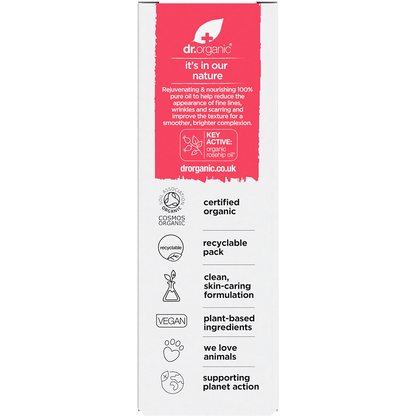 Back of Dr Organic Rosehip Oil box with product description, directions, and ingredients on a pink and white background.
