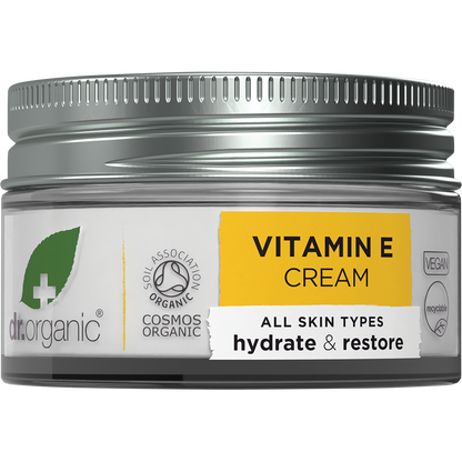 50ml jar of Dr Organic Vitamin E Cream featuring a white label with orange accents and botanical illustrations.