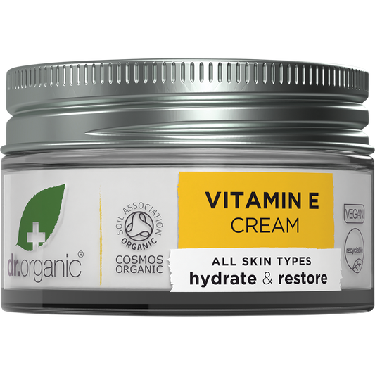 50ml jar of Dr Organic Vitamin E Cream featuring a white label with orange accents and botanical illustrations.
