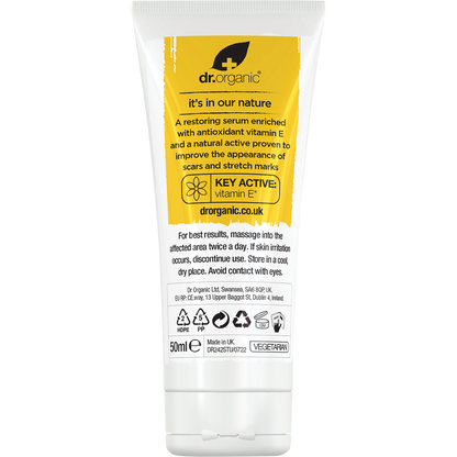 Back of a 50ml Dr Organic Vitamin E serum tube showing directions, warnings, and ingredients on a white background.