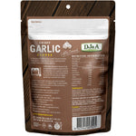 DJ&A Crispy Garlic Cloves 45g bag with a pile of whole roasted garlic cloves on a white background.