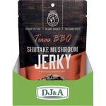 Back of a 60g DJ&A Shiitake Mushroom Jerky Texas BBQ bag showing nutrition facts and ingredients list.