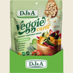 Retail display box of DJ&A Veggie Curls Original with multiple 90g snack packs on a white background.