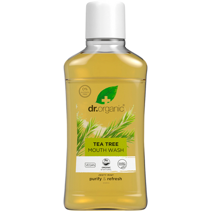 500ml bottle of Dr Organic Tea Tree Mouthwash, an alcohol-free purifying oral rinse with a green and white label.