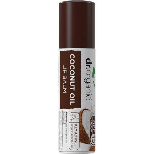 Dr Organic Coconut Oil lip balm tube with SPF 15, featuring a white cap and tropical branding.