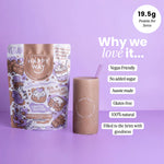 Close-up of a glass of chocolate smoothie with chocolate chips and Happy Way Double Choc Chip Vegan Protein Powder bag.