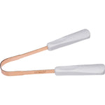Copper Dr Tung's tongue cleaner with a curved metal edge and green comfort-grip handles on a white background.