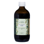 450ml bottle of Eumundi Botanicals Ayurvedic Iron plant-infused tea with a green label and white cap.