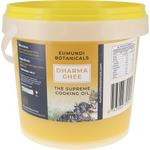 A 1L plastic bucket of Eumundi Botanicals Dharma Ghee containing milk-based cooking oil, with a yellow lid and a dark blue and yellow label.