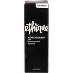 Ethique Honeysuckle warm peach lipstick in a sustainable cardboard tube, shown from a side-angled perspective.