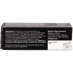 Ethique Honeysuckle warm peach lipstick in a sustainable cardboard tube, shown from a side-angled perspective.