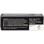 Ethique Poppy Ruby Red lipstick in a black compostable cardboard tube, shown standing on a white background.