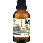 Side view of a 50ml Every Bit Organic Jojoba Oil bottle showing a green floral pattern on a white label.