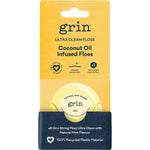 Retail display of 8 packs of Grin Coconut Oil Infused Floss and refills in a 100% recycled dispenser.