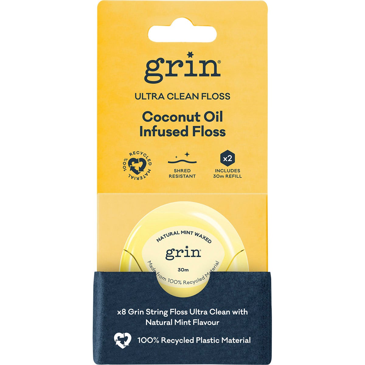 Retail display of 8 packs of Grin Coconut Oil Infused Floss and refills in a 100% recycled dispenser.