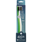 Grin Pro Ultimate Whitening Toothbrushes in green and white 2-pack boxes, featuring 100% recycled plastic handles.