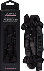 Black heatless hair curling set with a satin rod, two scrunchies, and a claw clip on a white background.