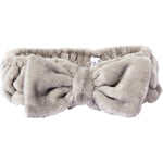 Grey Giovanni multi-purpose spa headband with a plush bow design on a white background.