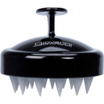 Black Giovanni scalp massager and shampoo brush with grey silicone bristles, viewed from an angled side profile.