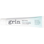 Grin Toothpaste Freshening 100g tube featuring a cool mint design on a white background.