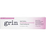 Side view of a Grin Strengthening Toothpaste 100g box highlighting natural ingredients and fluoride-free benefits.