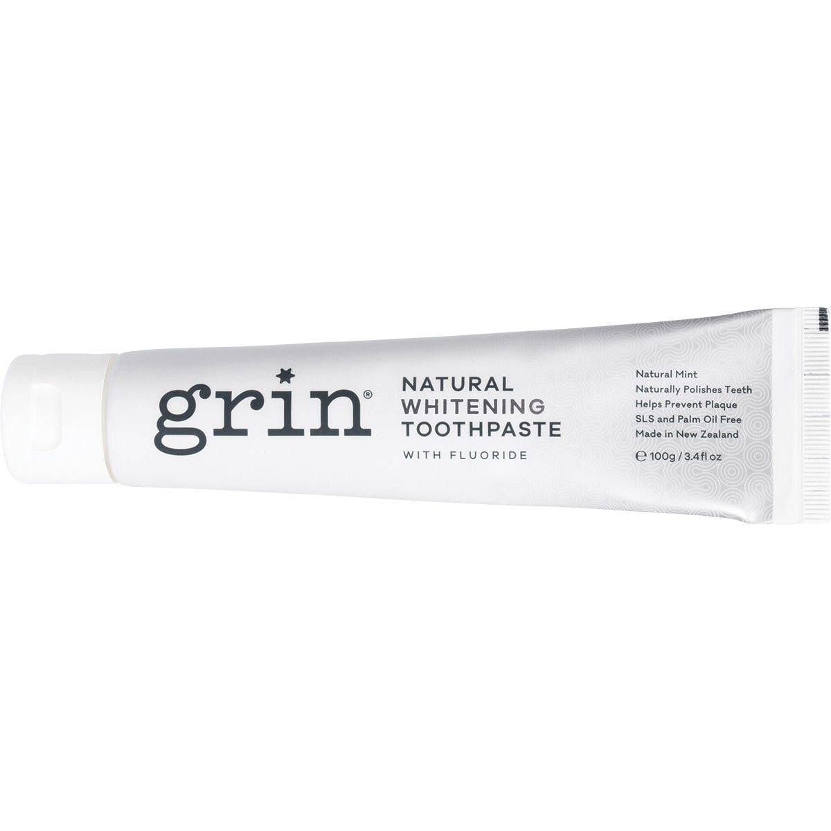 100g tube of Grin Natural Whitening Toothpaste with Fluoride shown against a light blue and white product box.