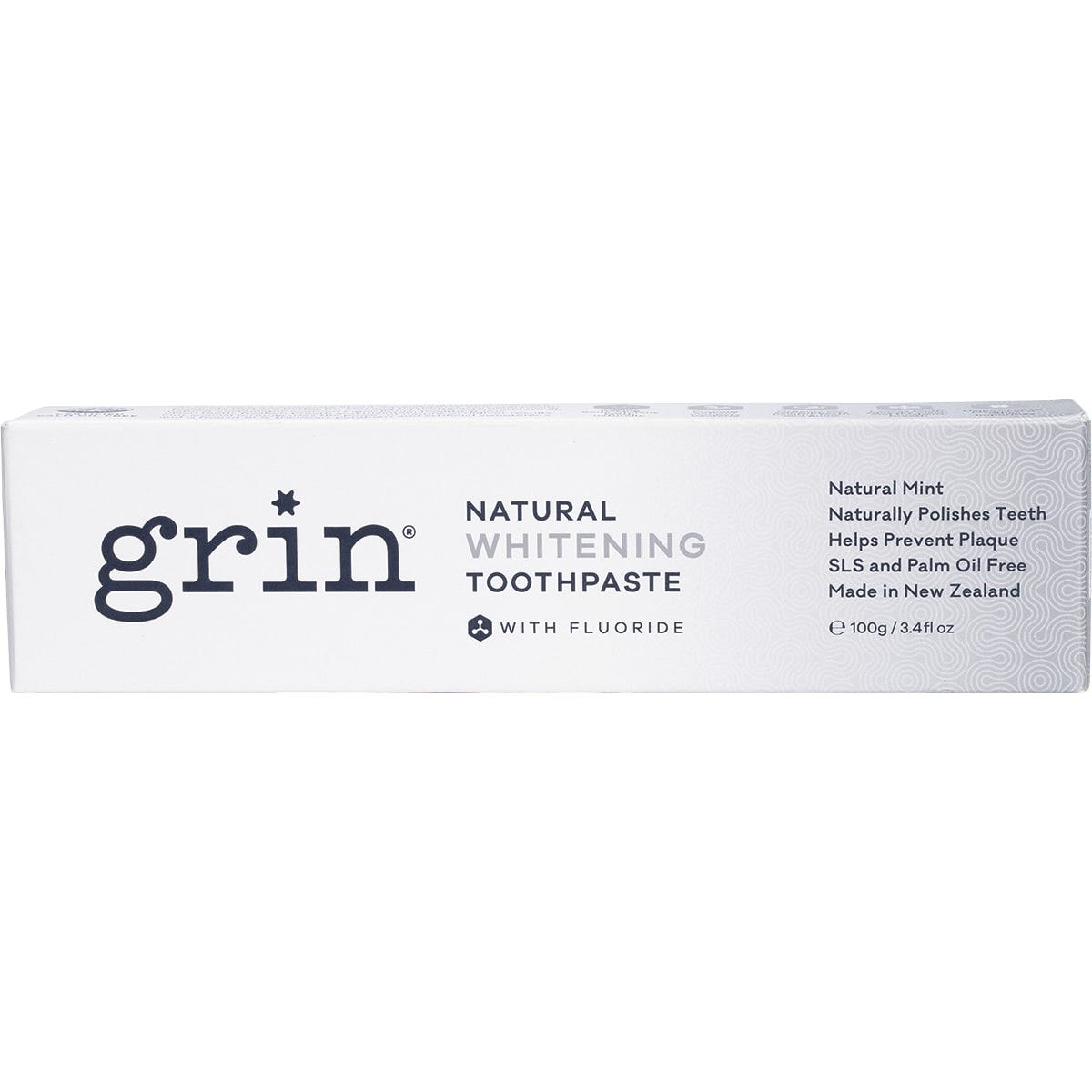Side view of a Grin Natural Whitening Toothpaste box highlighting key ingredients like baking soda and organic sea salt.