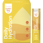 Happy Way Tropical Hydration box with a single sachet, a glass of yellow liquid, and fresh mango and coconut.