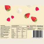 Back of a Happy Way protein bar package showing nutrition facts, ingredients, barcode, and decorative strawberry and cream swirl illustrations on a pale beige background.