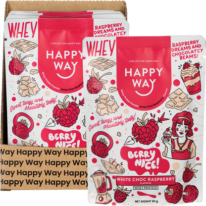 Happy Way White Chocolate Raspberry Whey Protein box, sachet, and a glass of pink protein shake with fresh raspberries.