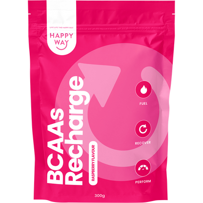 Pink supplement package labeled BCAA Recharge with Happy Way branding and a smiling emoji with tongue.