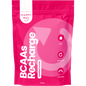 Pink supplement package labeled BCAA Recharge with Happy Way branding and a smiling emoji with tongue.