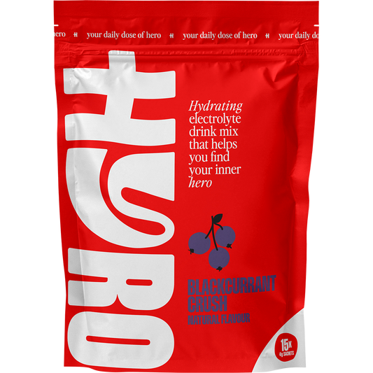 A 15-pack of Hyro Blackcurrant Crush electrolyte sachets in a white and purple bag.
