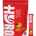 Orange Mango Hyro Electrolyte box, 15 individual sachets, and a glass of prepared drink with orange and mango slices.