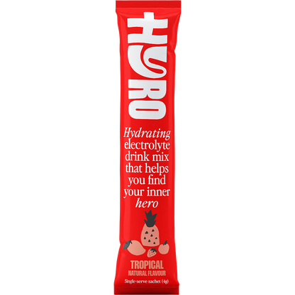 Single orange and white Hyro Tropical electrolyte sachet featuring a HASTA Certified logo on a white background.