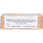 Harmony Soapworks Lemon Myrtle Soap Scrub bar with textured oats and poppy seeds on a white background.
