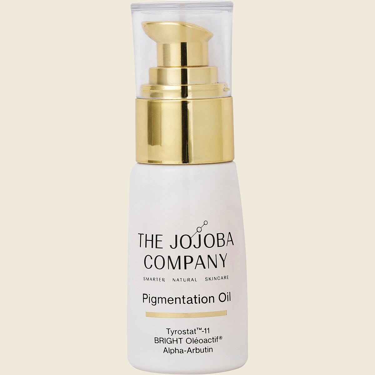30ml bottle of The Jojoba Company Jojoba Pigmentation Oil with a gold cap on a white background.