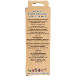 Close-up of a Jack N' Jill silicone baby toothbrush showing the soft bristles and clear safety shield.