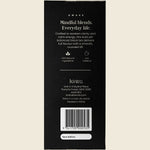 Side view of a 250g Kintra Blends Formosan Black Tea bag showing key features and benefits on a green and brown label.