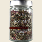 Kintra Blends Immunity 60g loose leaf tea in a glass jar with an orange label and wooden lid.