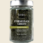 Kintra Blends 150g jar of loose leaf green tea with a white label and botanical green leaf illustrations.