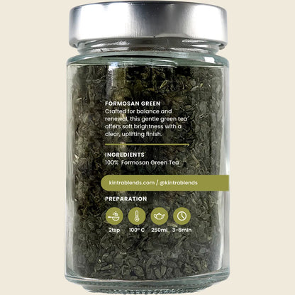 Back of a Kintra Blends 150g Green Tea jar showing nutritional facts and brewing instructions on a white label.