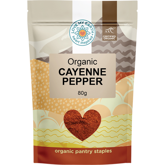 A 80g pouch of Love My Earth Organic Cayenne Pepper with a red label and a vibrant illustration of a chili.